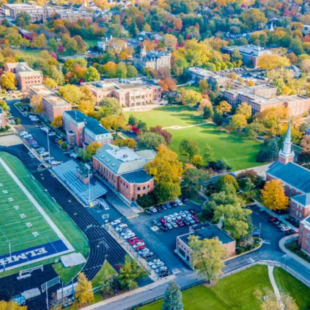 an-aerial-view-of-a-campus-with-a-football-field